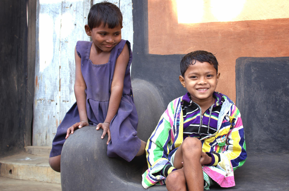 Two Indian children play together