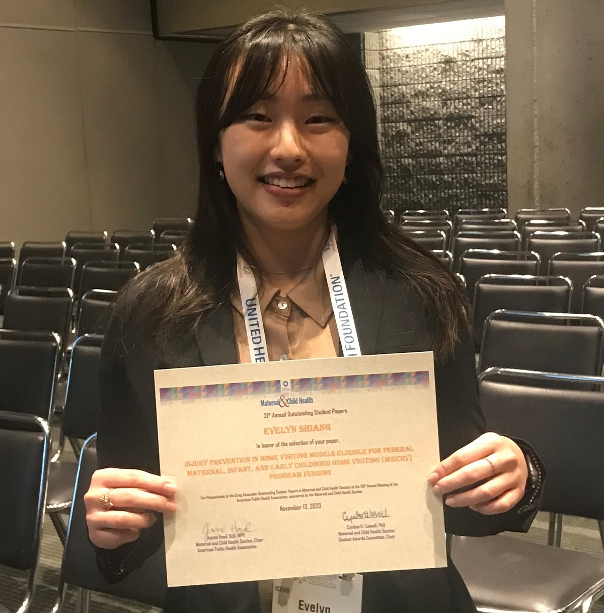 Evelyn Shiang shows off her award.