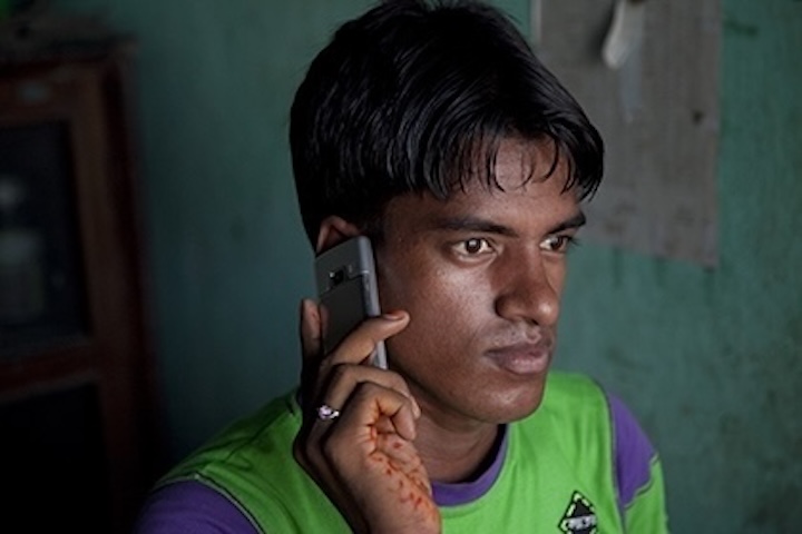 Young man with a mobile phone to his ear