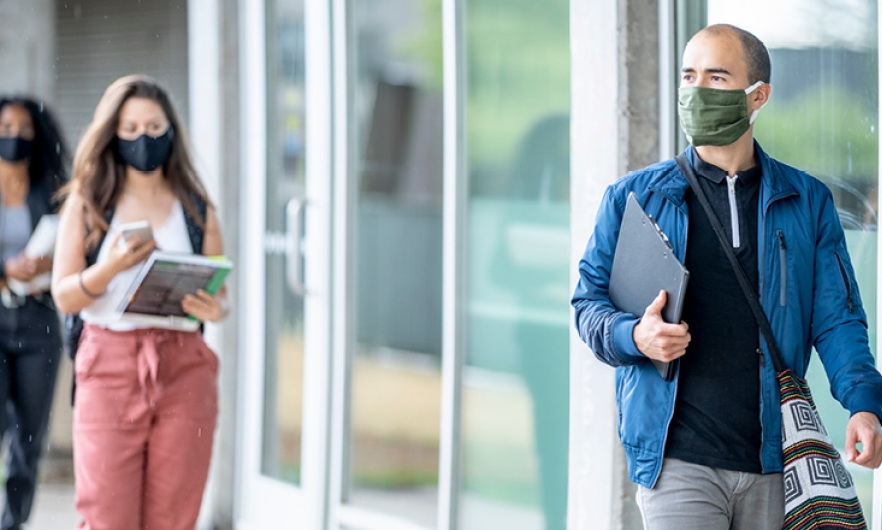 students wearing masks on campus