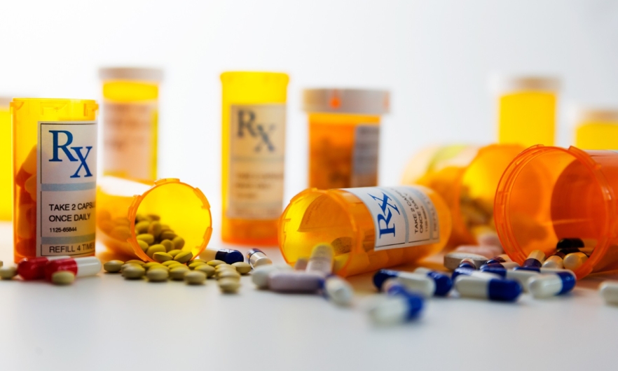 Prescription pill bottles with pills