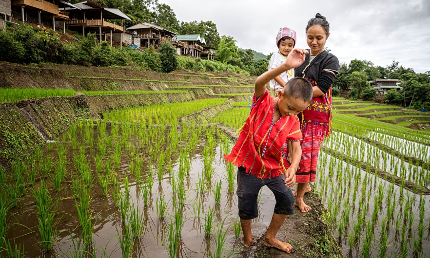 Mother with children in rural camp