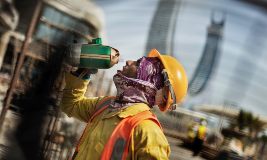 Worker taking a sip of water