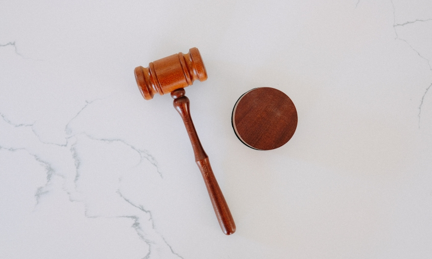 Judge's gavel against white background