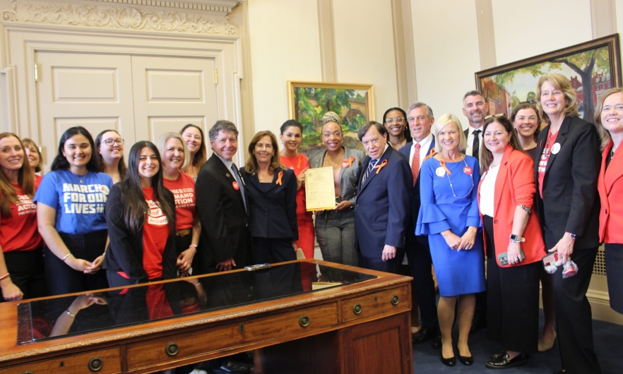 Governor John Carney and advocates at Delaware Bill Signing