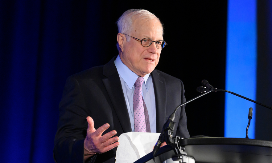 Dr. Duff Gillespie speaking at the 20th anniversary of the Wiliam H. Gates Sr. Institute in October 2019