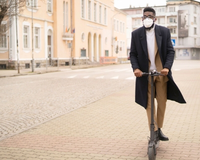 Young Black man on an e-scooter