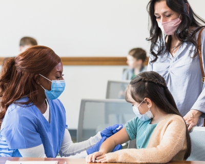 child getting vaccinated