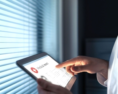 A medical record on a tablet.