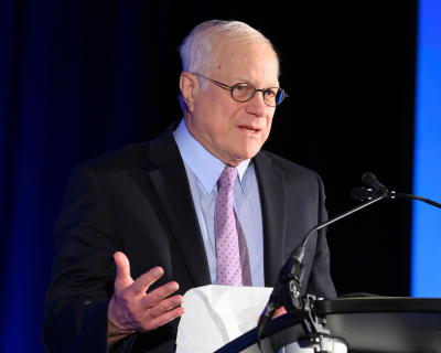 Dr. Duff Gillespie speaking at the 20th anniversary of the Wiliam H. Gates Sr. Institute in October 2019
