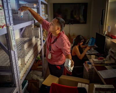 A pharmacist stocks PrEP medicine at a pharmacy in a community center operated by LoveYourself, a nonprofit impacted by the Trump administration&#039;s freeze on foreign aid, on February 19, 2025, in Mandaluyong, Metro Manila, Philippines