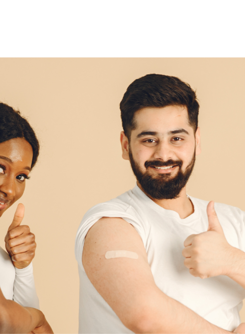 2 people with vaccination bandaids giving thumbs up 