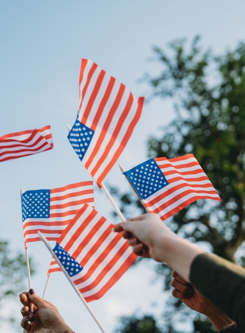 American flags in hands