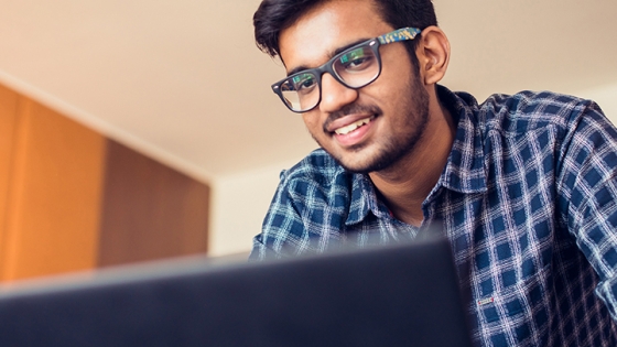 student looking at computer