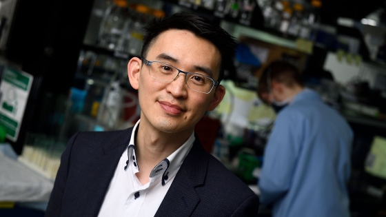 Anthony Leung stands in his lab