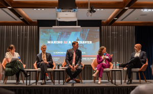 Biostatistician Elizabeth Stuart (in purple) makes a point to HHS assistant secretary Micky Tripathi; other AI event panelists (l to r): Alison Snyder, John Auerbach, and Jesse Ehrenfeld. 