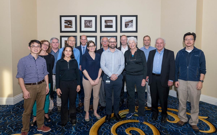 Ten BMB faculty members stand smiling in two rows