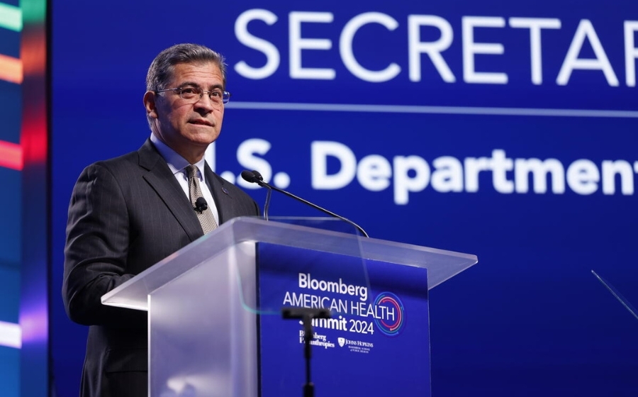 Xavier Becerra speaks from podium at 2024 Bloomberg American Health Summit