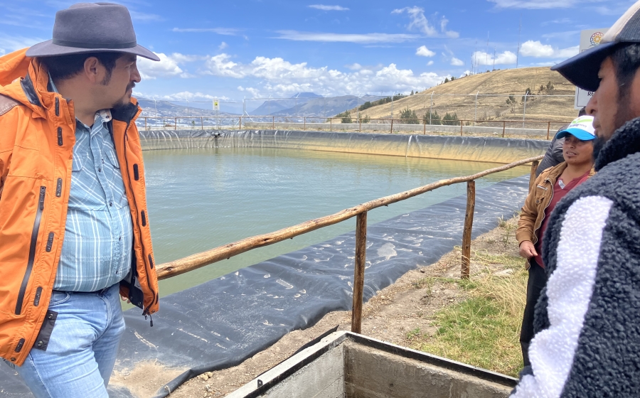 Learning about an Ecuadorian municipal water and sanitation project, one of many site visits that Kern participated in through her role at CAF. 