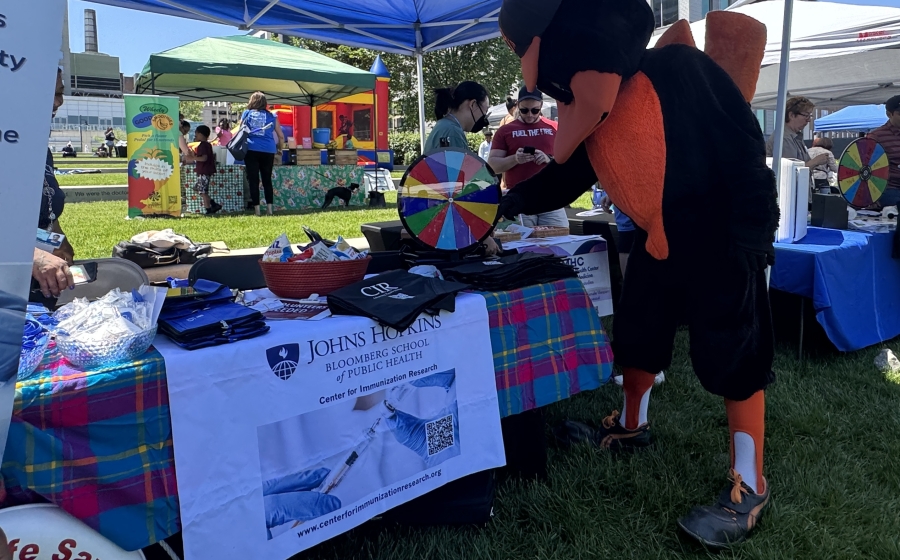 Oriole mascot spinning the wheel