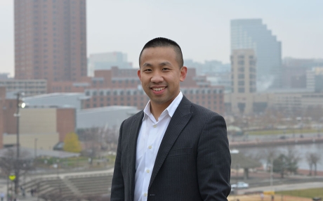 Clarence Lam in front of skyline
