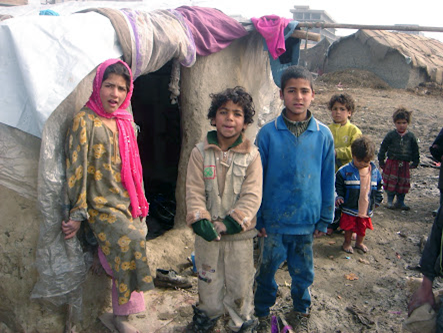 Internally displaced families from Helmand province settled for the winter in refugee camps in Kabul, Afghanistan