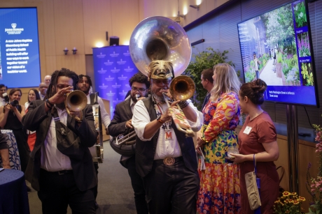 Second Line Band leads march into Sommer Hall