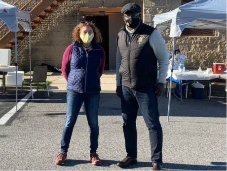 Lois Privor-Dumm and Terris King standing