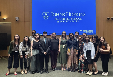 Group of people posing for photo