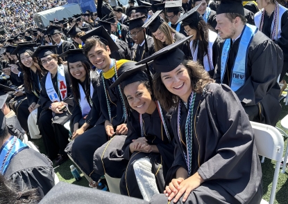 group photo of students in graduation attire