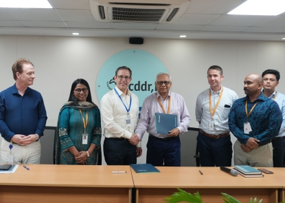 Dr. Judd Walson and Dr. Tahmeed Ahmed shaking hands